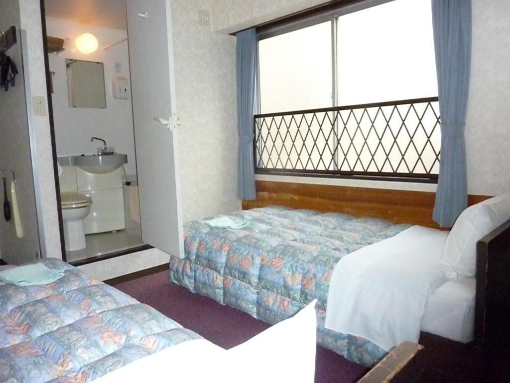 Otsuka City Hotel Tokyo prefektur Rum bild